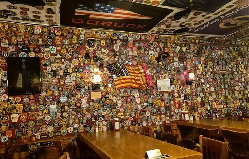 The dining room and patch-covered walls inside O'Hara's Pub