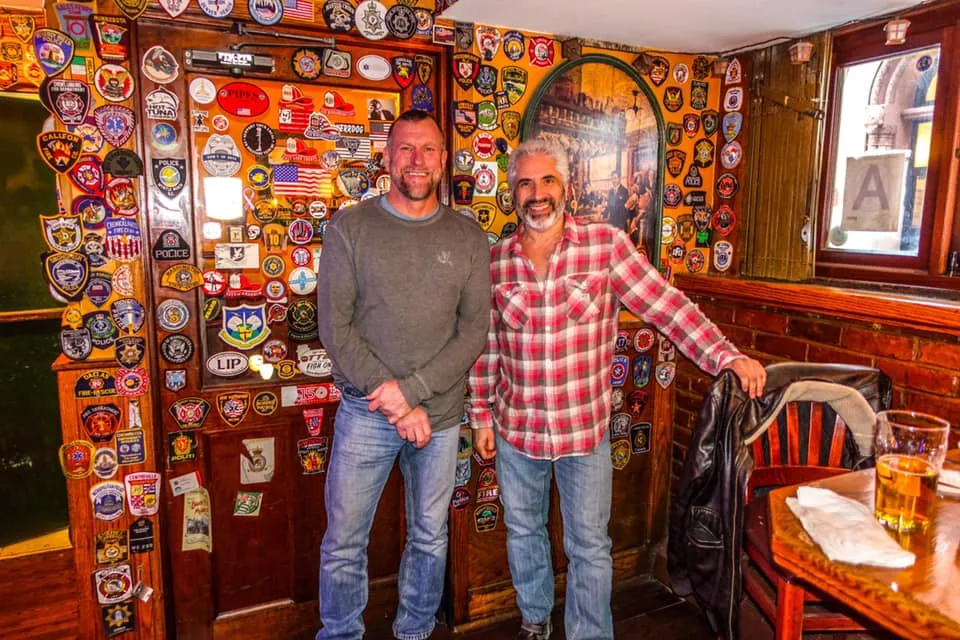Two friends at the bar