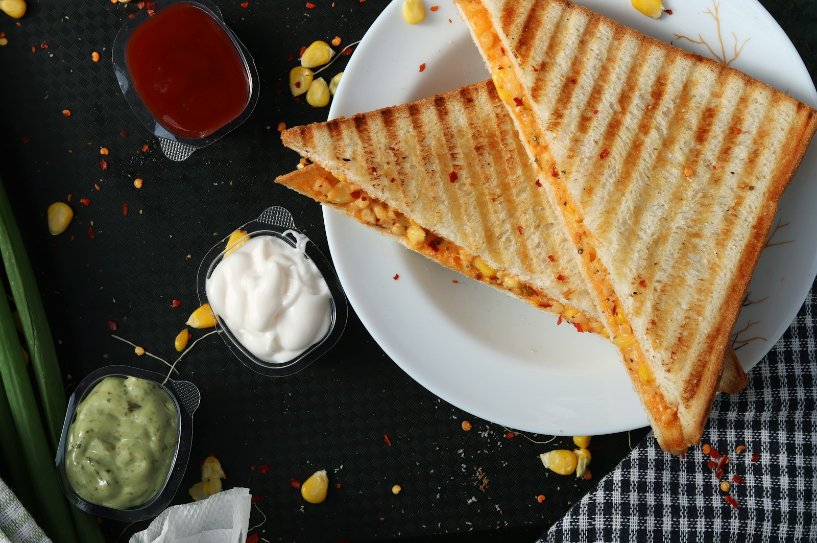 Grilled sandwich served on a wooden board